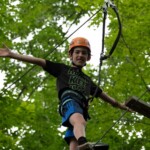boy on ropes course